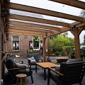 Pext Veranda Douglas - 6800x5000 muuraanbouw - staanders 18x18 cm - antraciet - gelaagd glas
